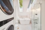 Upper Level Bathroom with Washer and Dryer at Ocean Echoes Villa